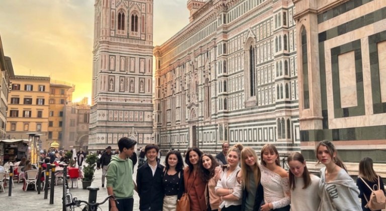 Middle school students gathered in the piazza in front of the Florence Duomo on their Italy excursion