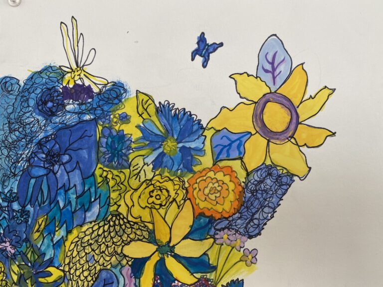 Student artwork of blue and yellow flowers