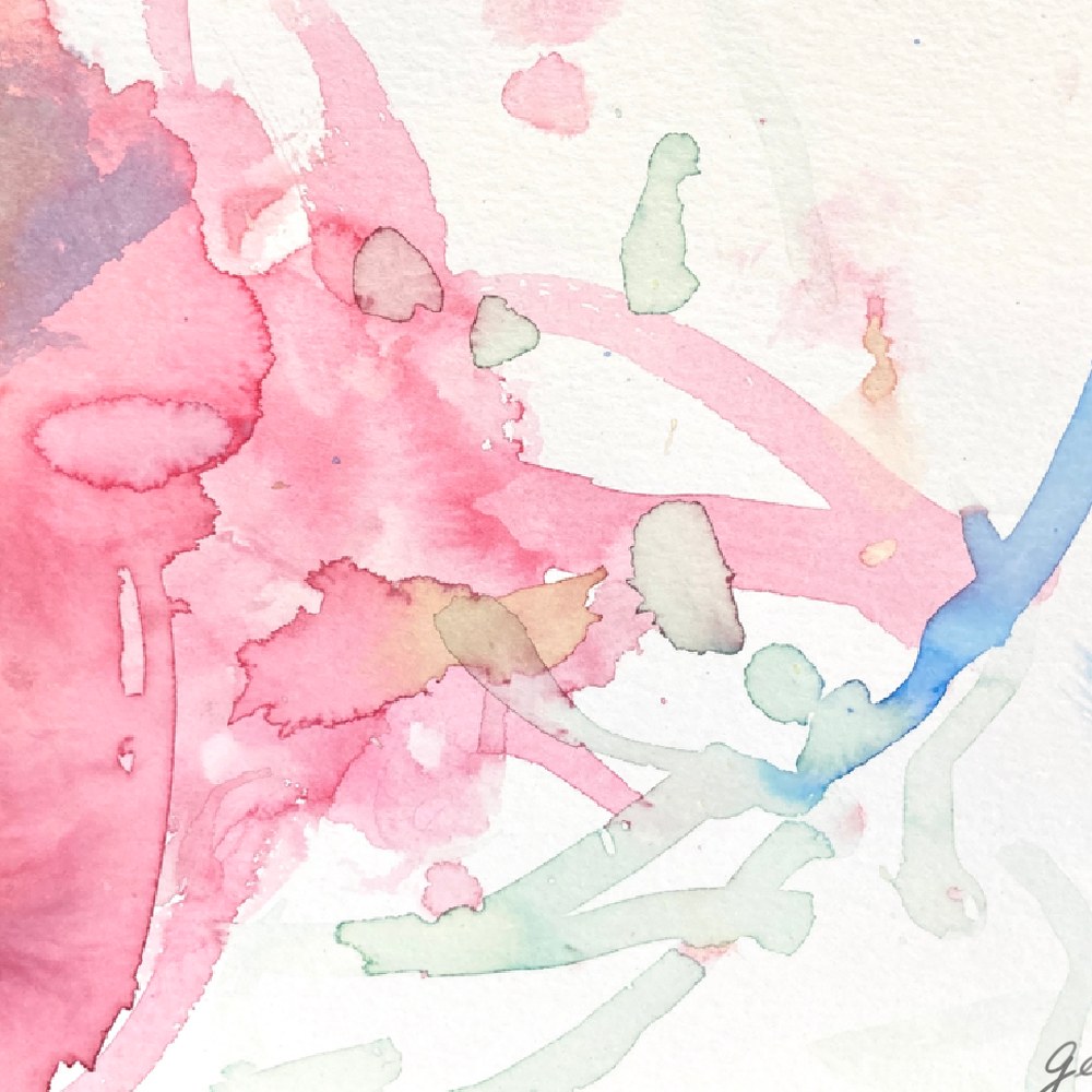 Child’s watercolour painting in pink and blue